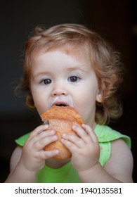 Baby With Bread. Cute Toddler Child Eating Sandwich, Self Feeding Concept