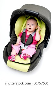 Baby In Car Seat Over White