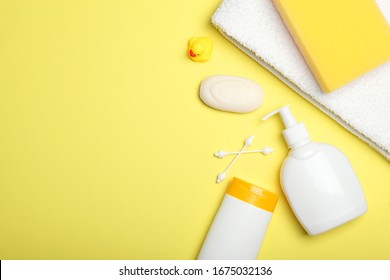 Baby Care Products On A Colored Background Top View. Daily Baby Care Products For Skin Care, For Bathing. Hygiene Of The Newborn.
