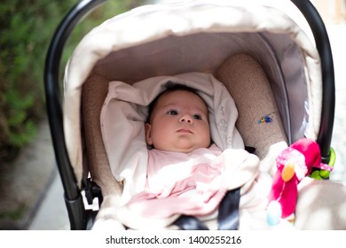 baby in baby carriage
