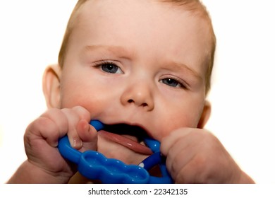 Baby Chewing On Teething Toy