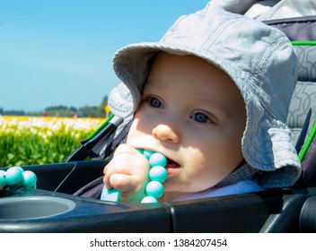 Baby Chewing The Teething Necklace