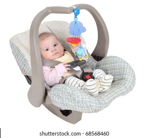 Baby In Child Car Seat Isolated Over White Background