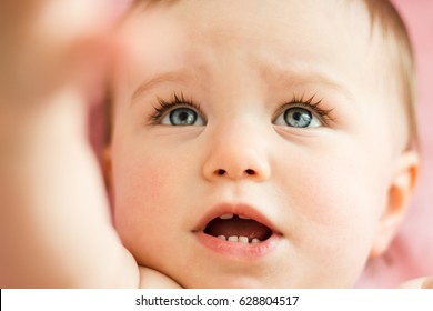 Baby Closeup Confused And Crying 