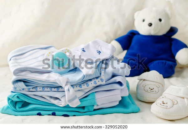 Baby clothes for\
newborn. In pastel colors