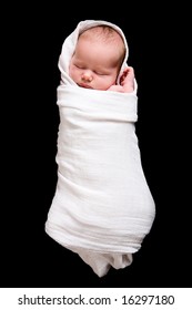 baby in swaddling clothes