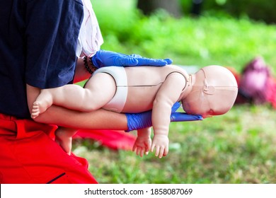 Baby CPR first aid training for choking - Powered by Shutterstock