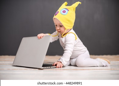 baby crawled to a computer