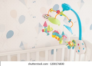 Baby Crib Mobile With Colorful Toys.