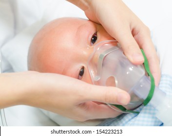 Baby Crying Wear Oxygen Mask