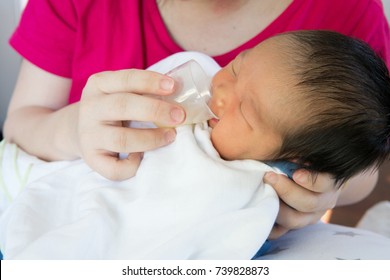 baby cup feeding for newborn. useful when small volumes of breastmilk/colostrum are being given and during emergency situations or mother has problem with her nipple.
