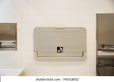 Baby Diaper Table In A Public Restroom. Child Changing Board In A Toilet.