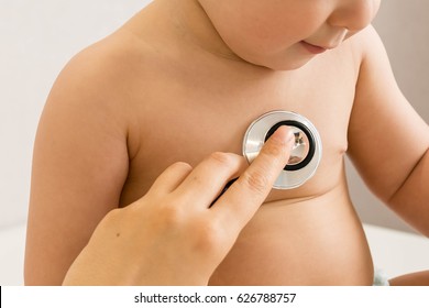 Baby At The Doctor Getting Breath Check Up With Stethoscope Unrecognizable