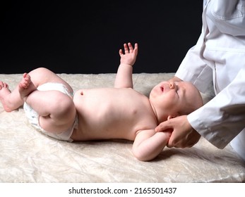 Baby And Doctor. Newborn Reflex Test