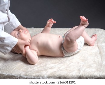 Baby And Doctor. Newborn Reflex Test