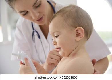 Baby In Doctor's Office For Medical Checkup