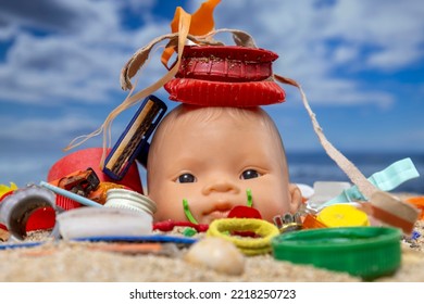 A Baby Doll Head Surrounded By Rubbish And Trash On A Beautiful Beach 