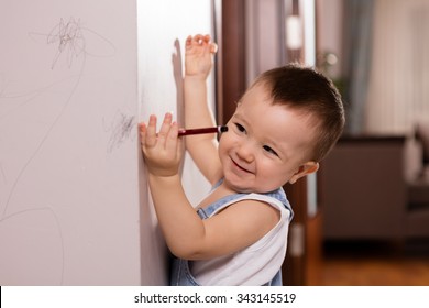 Baby Drawing On Wall.