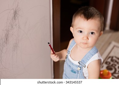 Baby Drawing On Wall.