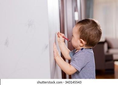 Baby Drawing On Wall.