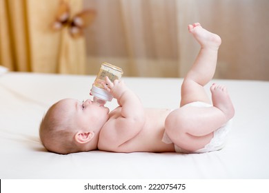 Baby Drinking Water From Bottle