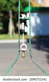 Baby Dummy Hanging On Fence. Lost Dummy. Baby Kidnapping Concept