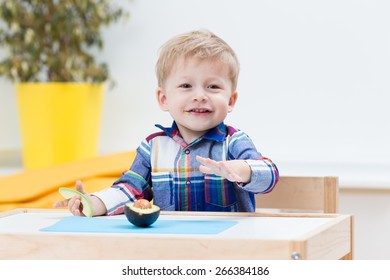 Baby Eating Avocado.