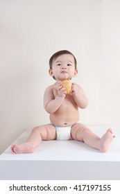 Baby Eating Bread