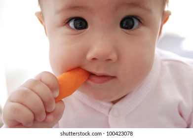 Baby Eating Carrot