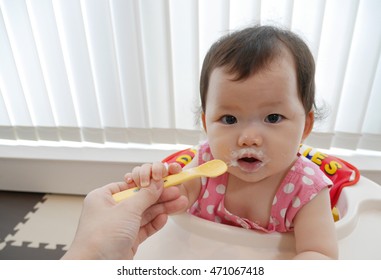 Baby Eating Baby Food, Yogurt