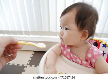 Baby Eating Baby Food, Yogurt