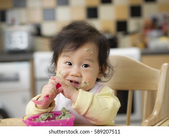 Baby Eating Messy Mashed Potato