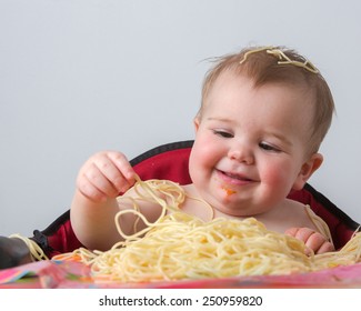 Baby Eating Pasta