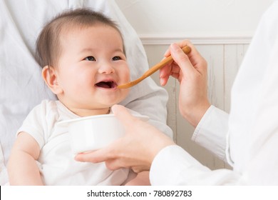 A Baby Eats A Baby Food