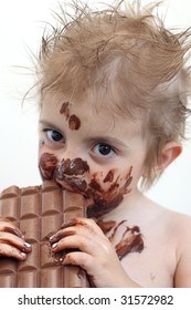 Baby With Face Covered In Chocolate