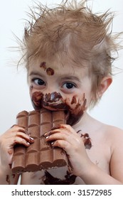 Baby With Face Covered In Chocolate