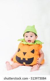 Baby In Fancy Pumpkin Costume