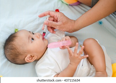 Baby Feeding With Liquid Medicine