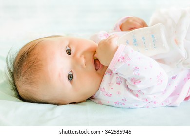 Baby Feeding Milk From Bottle  ,Because My Mother Worked Outside The Home.