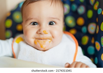 Baby Feeding Process. The First Baby Food. Little Baby Don't Like Food. Messy Face. Meal Time.