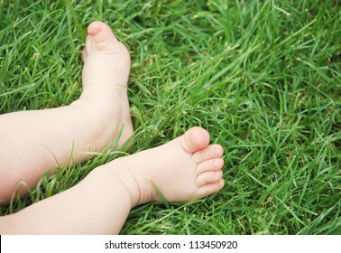 Baby Feet In The Grass