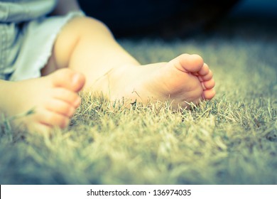 Baby Feet In Grass