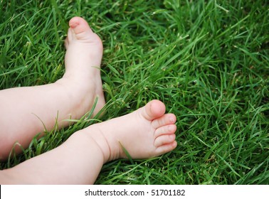 Baby Feet In The Grass