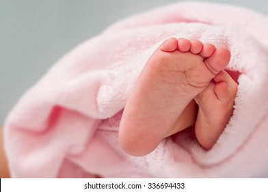 Baby Feet Wrapped In A Towel