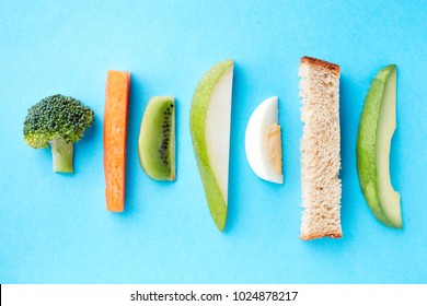 Baby Finger Food On Blue Background, Top View