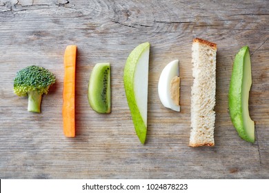 Baby Finger Food On Wooden Background, Top View