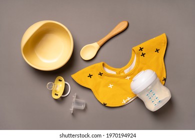 Baby Food Accessory On Grey Background. Serving Baby. Lunch Time.