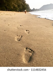 Baby Footprints In The Sand