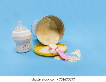 Baby Formula And Bottle With Milk White Background