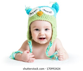 Baby In Funny Owl Knitted  Hat Owl On White Background